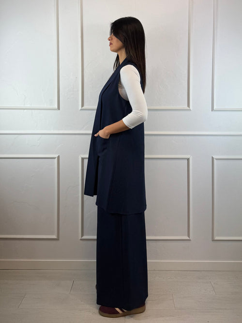 Gilet lungo con tasche