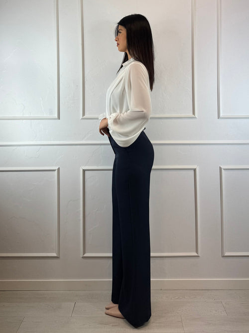 Pantalone a zampa con tasche americane