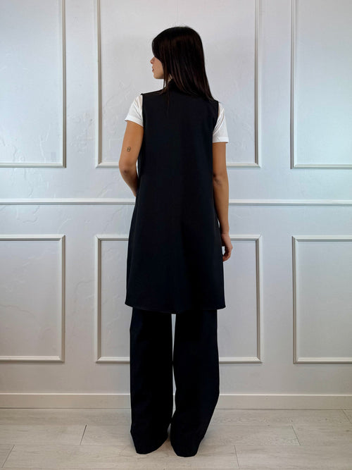 Gilet lungo con tasche