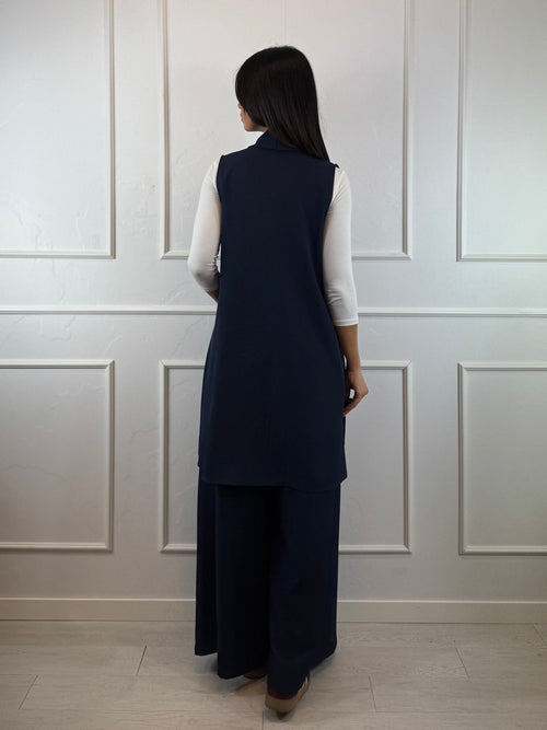 Gilet lungo con tasche
