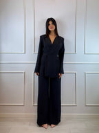 Tuta elegante con collo rever