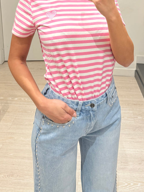 Jeans palazzo con borchie tonde