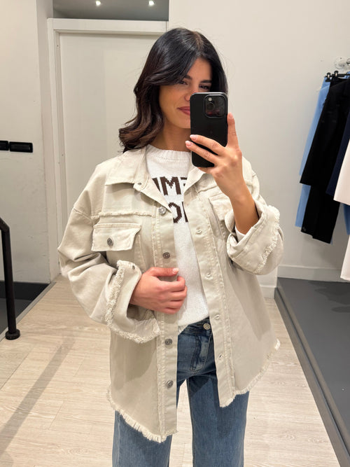 Giacca di jeans taglio vivo con tasche