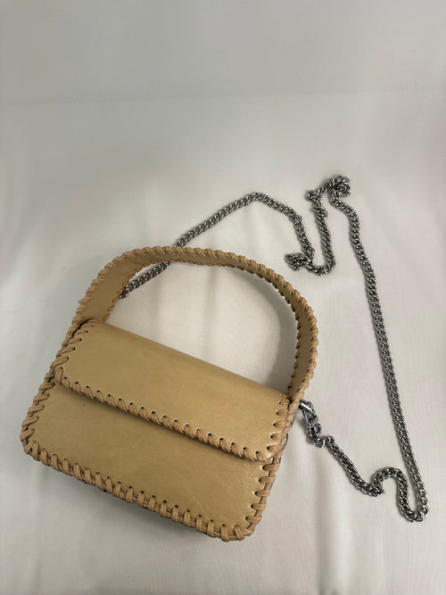 Borsa con borchie tonde ecopelle