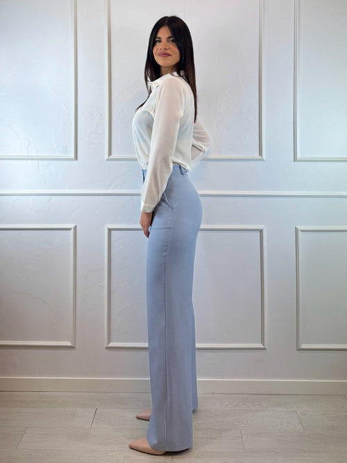 Pantalone a zampa con tasche americane
