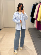 Giacca di jeans taglio vivo con tasche