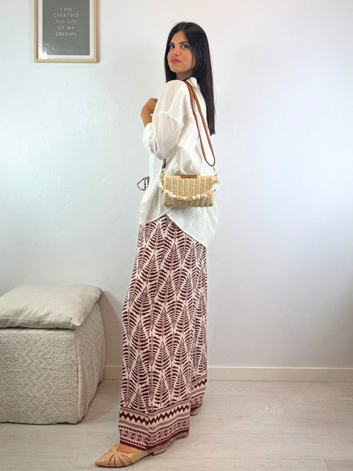 Borsetta a mano in paglia e manico particolare