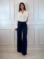 Pantalone a zampa con tasche americane