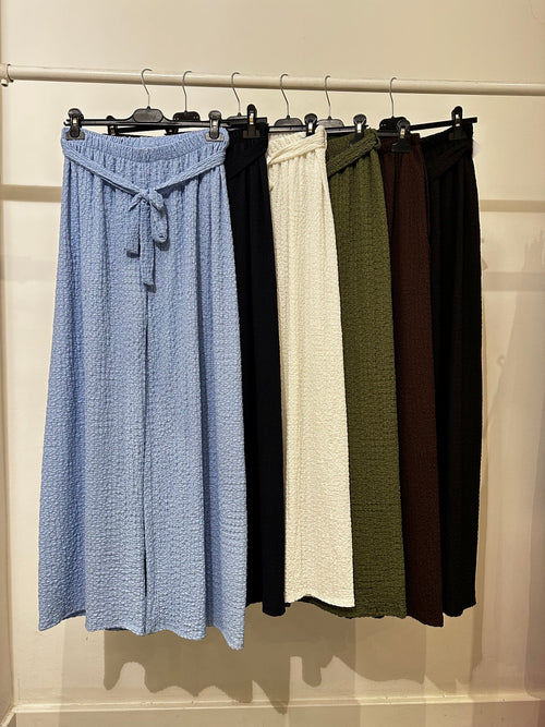 Pantalone palazzo lavorato con cintura
