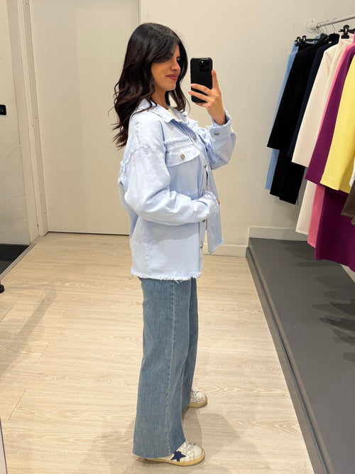 Giacca di jeans taglio vivo con tasche