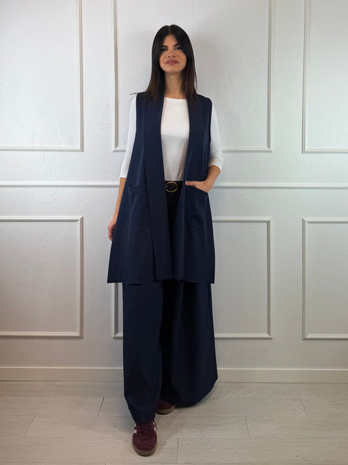 Gilet lungo con tasche