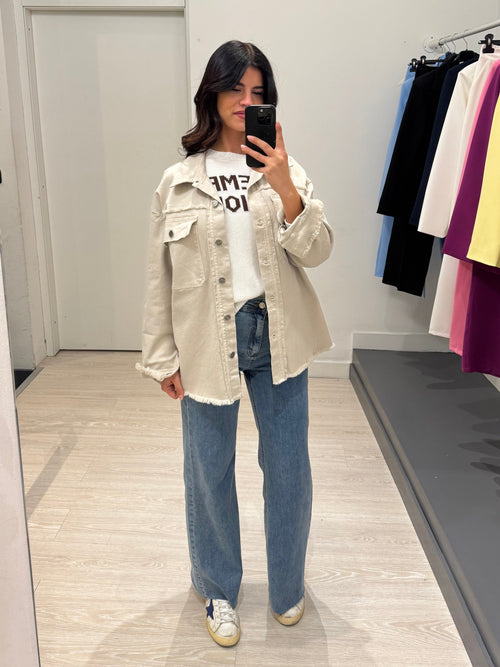 Giacca di jeans taglio vivo con tasche