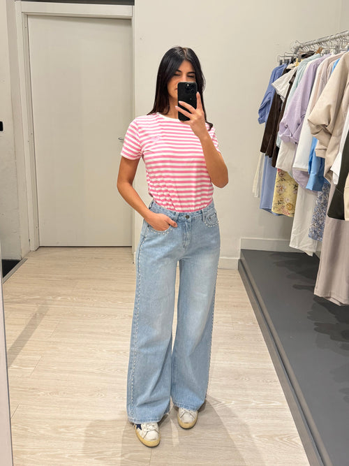 Jeans palazzo con borchie tonde