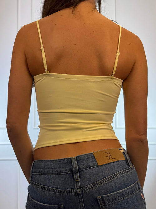 Corpetto strutturato e spalline sottili