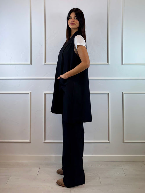 Gilet lungo con tasche