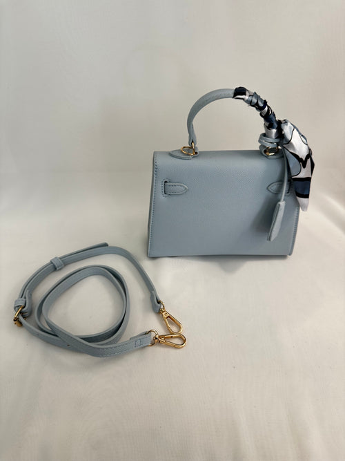 Borsa piccola fibbia e foulard ecopelle