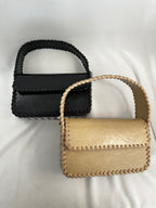 Borsa con borchie tonde ecopelle
