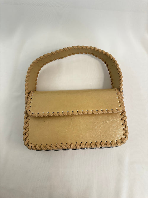 Borsa con borchie tonde ecopelle